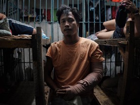 Francisco Santiago Jr., 21, is recuperating from his gunshot wounds while inside a jail cell at the Manila Police Detachment. The police said that Santiago was selling drugs and was shot during a sting operation.