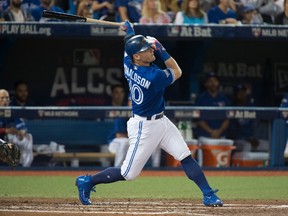 The Toronto Blue Jay's Josh Donaldson hits a home run against the Cleveland Indians in game four of the ALCS at the Rogers Centre in Toronto on Tuesday.