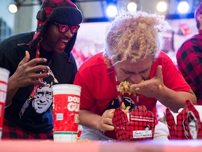 Step Daddy J, an amateur eater from the United States, during the amateur contest at the World Poutine-Eating Championship.