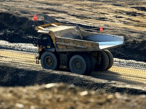 A 400-ton heavy hauler truck makes its way across a Shell Albian Sands' Jackpine Mine pit in Sept. 2014.