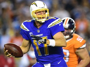 San Diego Chargers' quarterback Philip Rivers hangs in the pocket before letting go with a pass during NFL action Thursday night in San Diego. Rivers became the most prolific passer in team history in leading the Chargers to a 21-13 victory over the Broncos.