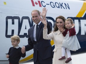 The Duke and Duchess of Cambridge along with their children Prince George and Princess Charlotte get on a float plane as they prepare to depart Victoria, B.C. Saturday, Oct. 1, 2016.