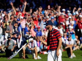 Dustin Johnson of the U.S. pumps his fist on the 15th green at the Ryder Cup on Oct. 1.