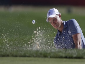 Europe's Danny Willett hits from the bunker on the ninth hole at the Ryder Cup on Oct. 2.