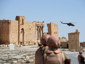 Russian army soldiers patrol the ancient Syrian city of Palmyra on May 5, 2016