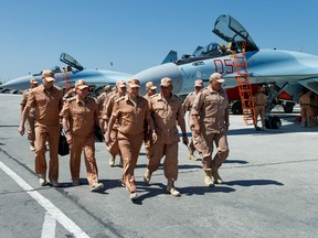 Russia ratified a treaty with Syria on Friday that gives Moscow its first permanent airbase in the Middle East, a symbol of the Kremlin's desire to project strength overseas, as Russian officials considered renewing other Soviet-era bases in Cuba and Vietnam.