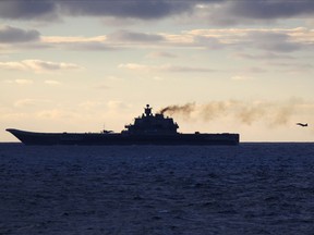 A plane coming in to land on the Russian aircraft carrier Admiral Kuznetsov in international waters off Norway on Oct. 19.