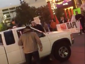 A truck ploughs into a protest by Native Americans against Columbus Day in Reno, Nevada on Oct. 10.