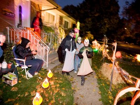 Trick-or-treaters photographed in St. Catharines, Ont. on October 31, 2011.