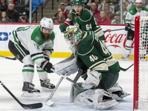 Minnesota Wild goalie Devan Dubnyk stops a point blank shot by Dallas Stars right wing Patrick Eaves during the second period of game Saturday in St. Paul, Minn.
