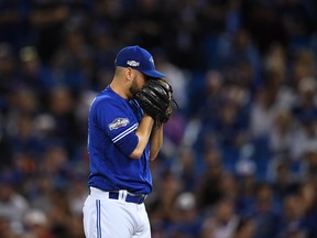 Toronto Blue Jays starter Marco Estrada readies to pitch in the first inning against Cleveland in an ALCS game on Oct. 19, 2016.