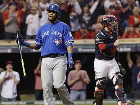 Toronto Blue Jays' Edwin Encarnacion, left, reacts after striking out against Cleveland closer Cody Allen in the ninth inning in Game 2.
