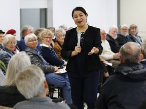 Minister of Democratic Institutions Maryam Monsef, the MP for Peterborough- Kawartha, speaks to people attending a town hall meeting on Oct. 13, in Selwyn Township, Ont.