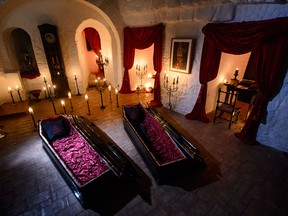 Guests will bed down for the night — not in the four-posters some might otherwise have wished for, but in red velvet-trimmed coffins.