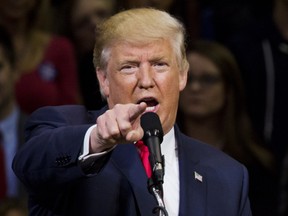 TOPSHOT - Republican presidential nominee Donald Trump speaks during a rally at Mohegan Sun Arena in Wilkes-Barre, Pennsylvania on October 10, 2016. / AFP PHOTO / DOMINICK REUTERDOMINICK REUTER/AFP/Getty Images