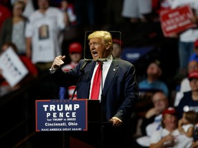 Donald Trump, 2016 Republican presidential nominee, is seen through a teleprompter as he speaks during a campaign event in Cincinnati, Ohio, U.S., on Thursday, Oct. 13, 2016.