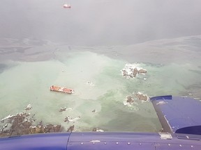 A tug boat that ran aground near British Columbia's Great Bear Rainforest is seen on Thursday, Oct. 13, 2016 in this aerial handout photo