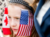 A girl waits for President Barack Obama to greet Prime Minister Justin Trudeau on the South Lawn of the White House in March 2016.