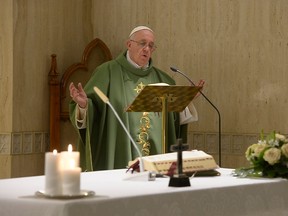 Pope Francis celebrates mass at the Vatican's Santa Marta hotel in 2015.