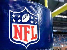 The NFL logo is shown on goal post padding in Detroit.
