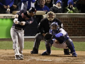 Cleveland Indians' Jason Kipnis hits a three-run home run against the Chicago Cubs during the seventh inning of the World Series on Saturday in Chicago.