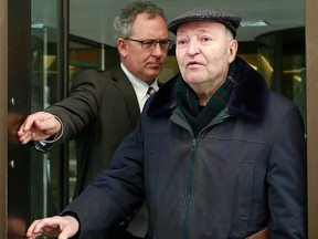 Reverend Jacques Faucher, 76, leaves on bail (following charges of gross indecency and indecent assault on a seven-year-old boy dating back to between 1971-73) from the Elgin Street courthouse on Feb. 14, 2013