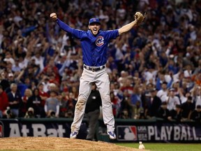 Chicago Cubs third baseman Kris Bryant leaps in the air after the final out of Game 7 of the World Series on Nov. 3.