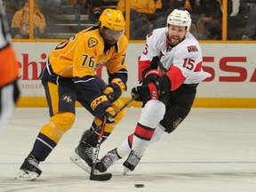 Nashville Predators defenceman P.K. Subban (left) skates against Ottawa Senators forward Zack Smith on Nov. 8.