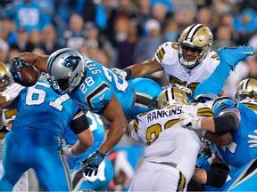 Carolina Panthers running back Jonathan Stewart dives into the end zone for a touchdown in the second quarter of Thursday's 23-20 Panthers victory over the New Orleans Saints.