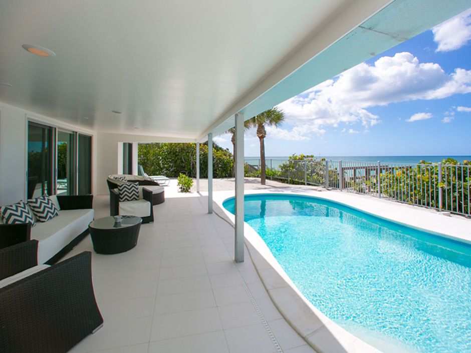 For Sale One hundred feet of quiet Florida beachfront, with pool, renovated house, on Manasota