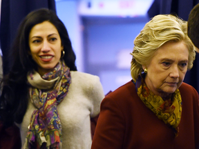 Hillary Clinton with longtime aide Huma Abedin onboard her plane in October 2016.