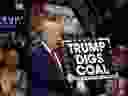 Republican presidential nominee Donald Trump  holds a sign supporting coal during a rally at Mohegan Sun Arena in Wilkes-Barre, Pennsylvania on October 10, 2016