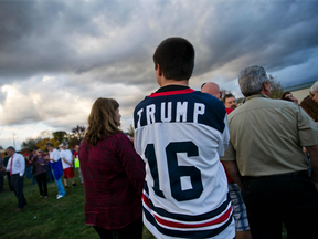 Donald Trump supporters stand in line before a rally at a sports facility in Newtown, Pa. on Oct. 21.