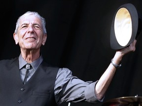 This file photo taken on July 20, 2008 shows Canadian singer Leonard Cohen greeting the public during the international Festival of Beincassim. 
Leonard Cohen, the storied musician and poet hailed as one of the most visionary artists of his generation, has died at age 82, his publicist announced on November 10, 2016.