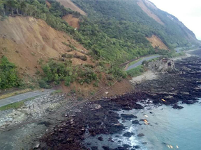 A handout photo taken and received on November 14, 2016, show earthquake damage to State Highway One near Ohau Point on the South Island's east coast.