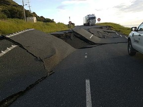 A handout photo shows earthquake damage to State Highway One near Oaro on the South Island's east coast on November 14.  A powerful 7.8-magnitude earthquake killed two people and caused massive infrastructure damage in New Zealand, stranding residents and tourists alike.