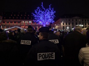 French policemen stand guard at the Christmas market on its opening day in Strasbourg, eastern France, on November 25, 2016.
For security reasons the city centre has been closed to car traffic during the whole period of Strasbourg's Christmas market.