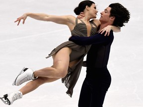 Canada's Tessa Virtue (L) and Scott Moir perform during the ice dance free dance at the Grand Prix of Figure Skating 2016/2017 NHK Trophy in Sapporo on November 27, 2016.