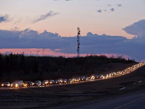 Traffic lines the highway as residents leave Fort McMurray, Alta., on May 3, 2016.