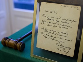 A short poem by Anne Frank, handwritten and dated in Amsterdam on March 28, 1942, is displayed at Bubb Kuyper auction house prior to the auction in Haarlem, Netherlands, Wednesday, Nov. 23, 2016.