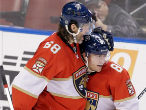 Florida Panthers centre Jonathan Marchessault (right) celebrates a goal with linemate Jaromir Jagr on Oct. 22.