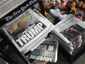 Front pages from New York City newspapers feature President-elect Donald Trump on November 9, 2016 in New York City.