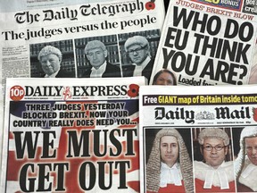 A selection of the front pages of British newspapers taken on Nov. 4, 2016, following the High Court ruling that the Conservative government does not have the power on its own to trigger Article 50 of the Lisbon Treaty.