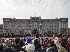 Crowds outside Buckingham Palace during the Changing of the Guard on November 19, 2016 in London, England.