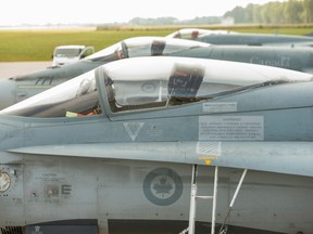 CF-18 fighter jets sit on the tarmac at the NATO airbase at the NATO Baltic Air Policing mission in  Lithuania in 2014.