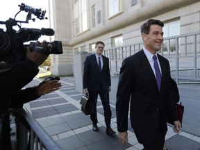 Bill Baroni, right, New Jersey Gov. Chris Christie's former top appointee at the Port Authority of New York and New Jersey, arrives at Martin Luther King, Jr., Federal Court, Friday, Nov. 4, 2016