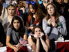 Hillary Clinton supporters watch election results come in on election night.