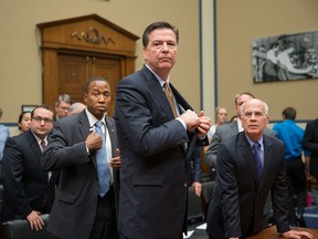 FBI Director James Comey appears before the House Oversight and Government Reform Committee on Capitol Hill in Washington on July 7.