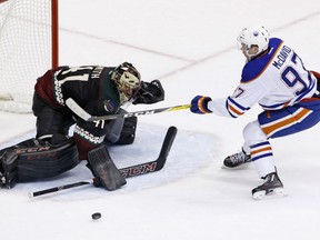 Mike Smith of the Arizona Coyotes denies Connor McDavid of the Edmonton Oilers during the shootout in NHL action Friday in Glendale, Az. The Coyotes won 3-2 to snap Edmonton's three-game winning streak.