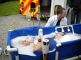 Volunteers with Cryonics UK train with a dummy on the process in which a person is 'frozen in time' after death